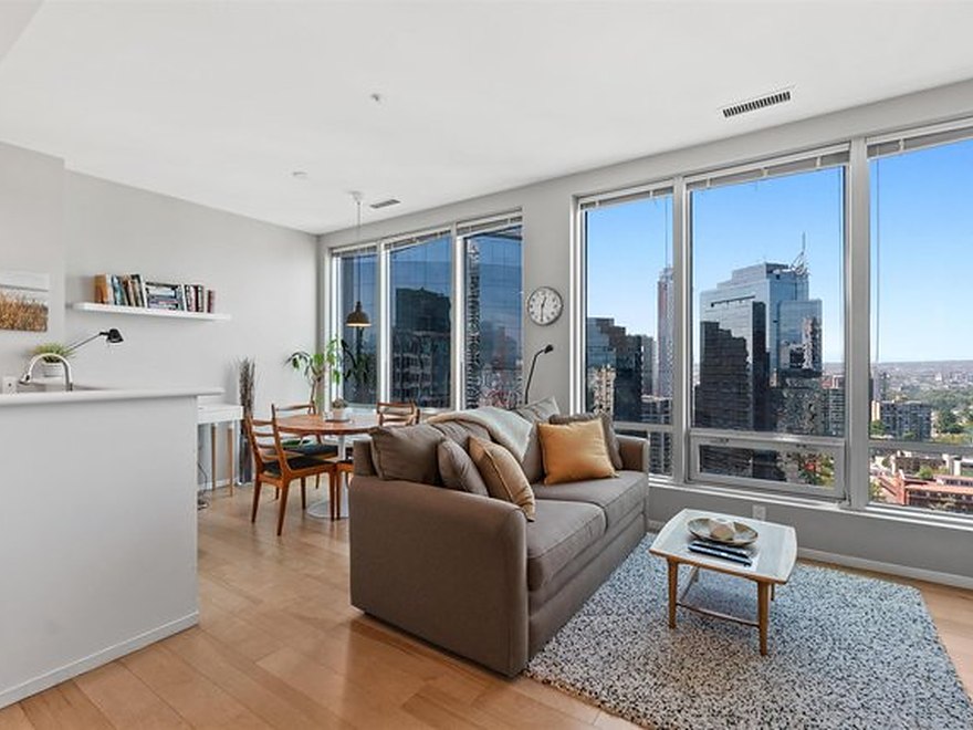 A bright, well-styled living room in a short term rental